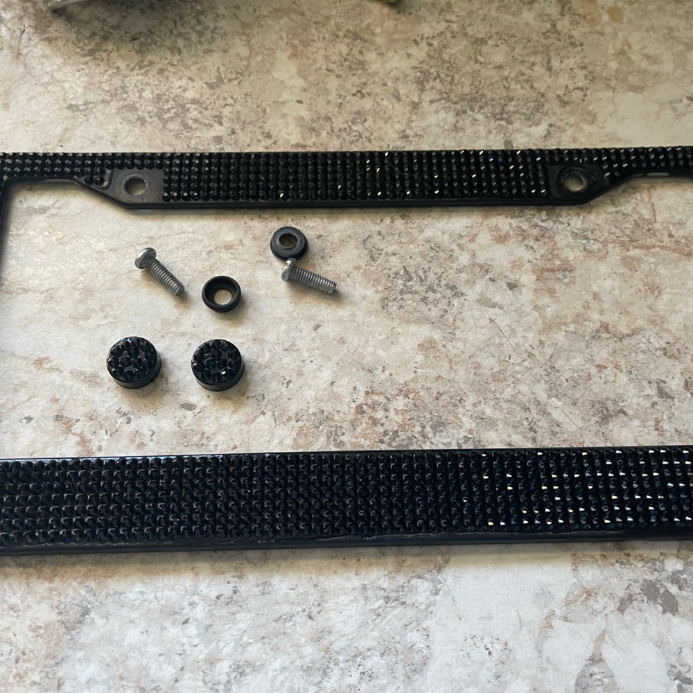 Super cute Black shimmery license plate cover.